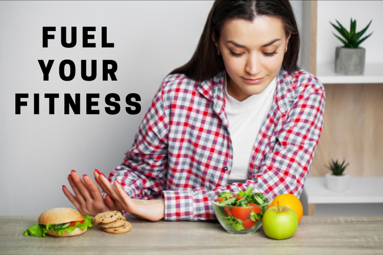 Woman picking between healthy and unhealthy foods, captioned "Fuel Your Fitness